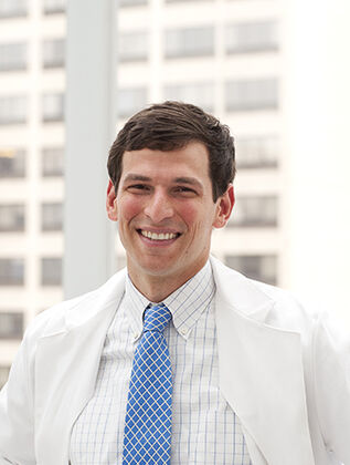 Photo of David Fajgenbaum, MD, MBA, MSc